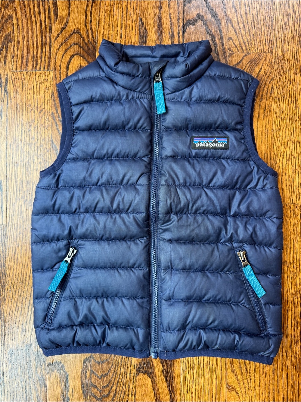 Patagonia Kids Navy Quilted Puffer Vest with Teal Zipper Pulls